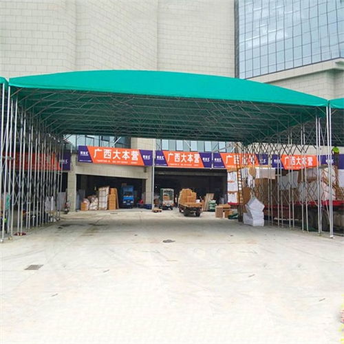 长春宽城工厂高空移动推拉雨棚在仓储物流中的应用